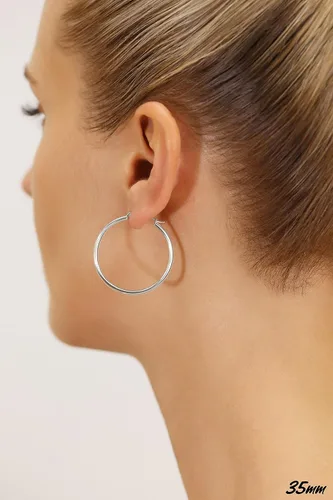 Vista 3 de Aretes redondos clásicos de oro blanco de 14K sin extremos