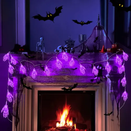 Vista 5 de JMEXSUSS Guirnalda de luces moradas de Halloween, 15.2 pies, 30 luces LED de mano de esqueleto, funciona con pilas, luces de Halloween