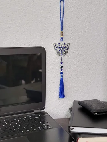 Vista 6 de LUCKBOOSTIUM Dijes de mariposa con diseño de ojo turco central en piedra de cristal azul con borlas para buena suerte, protección y bienestar