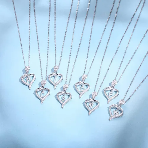 Vista 4 de Agvana Regalos para el día de San Valentín para ella, collares con inicial de plata esterlina para mujer, collar con dije de corazón de flor