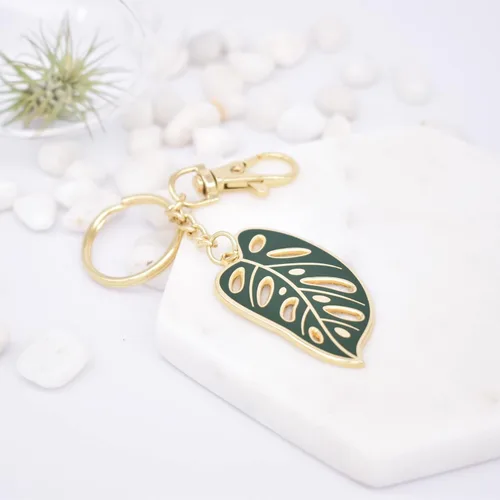Vista 2 de Monstera - Llavero de plantas Regalos para amantes de las plantas para mamá de plantas, regalos de jardinería para mujeres, llaveros únicos