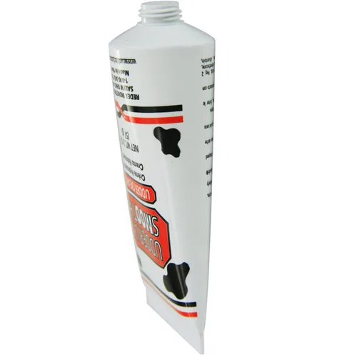 Vista 4 de Udderly Smooth Crema de ubre, hidratante para la piel, tubo de 2 onzas