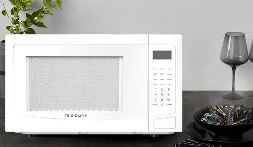 Vista 7 de Frigidaire Microondas de 1.1 pies cúbicos de 1000 vatios, color blanco