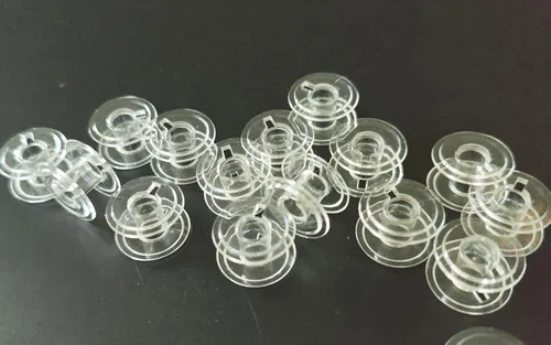 Vista 4 de HONEYSEW Bobinas de plástico transparente clase 15 para máquinas de coser cantantes (20 unidades/paquete)