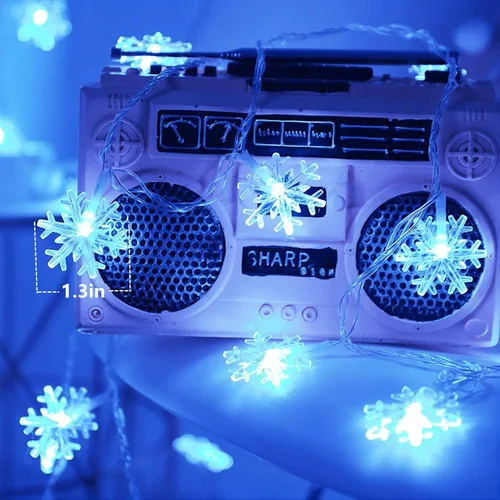 Vista 4 de Luces de Navidad, 20 pies, tira de 40 luces led con forma de copo de nieve, azules, funciona con pilas, guirnalda de luces para dormitorio, patio