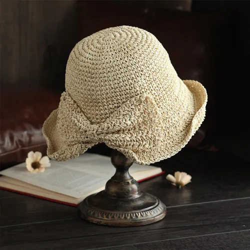 Vista 2 de Sombrero de playa plegable de ala ancha con paja, gorra de cubo de verano con lazo para mujeres y niñas Beige