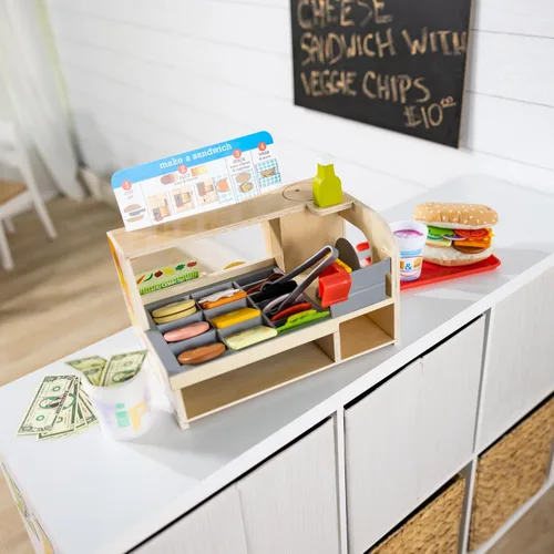 Vista 8 de Melissa & Doug Slice-Stack-Serve, mostrador de sándwiches de madera, tienda de juego de simulación con comida de juguete, dinero de juguete