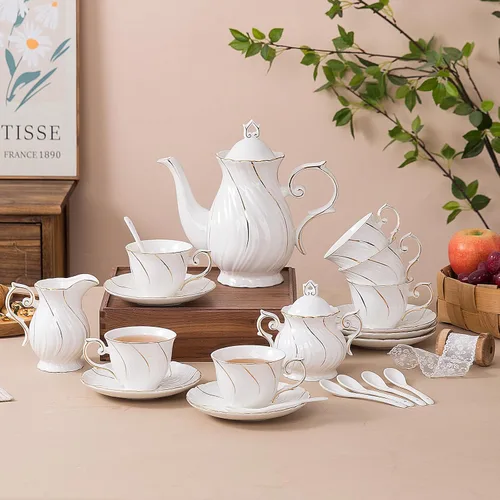 Vista 6 de Agyiuns Juego de té de 21 piezas de tazas de té y platillos de cerámica, juego de 6 con azúcar y crema y tetera, juego de tetera para adultos