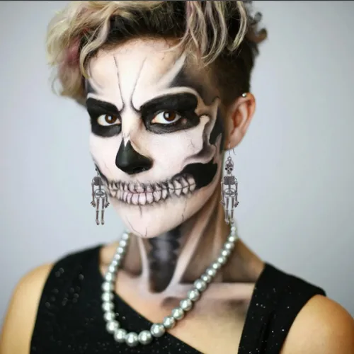 Vista 3 de Aretes de esqueleto de Halloween, aretes colgantes de esqueleto de calavera espeluznante para mujeres y niñas, aretes de fantasma para disfrazarse