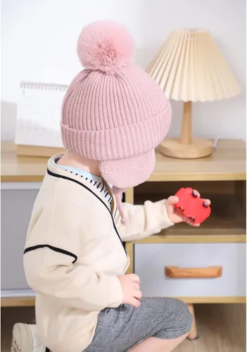 Vista 5 de CHOIEO Gorro de invierno para niños pequeños gorro con solapa para las orejas gorro de punto suave y cálido con forro polar con pompón