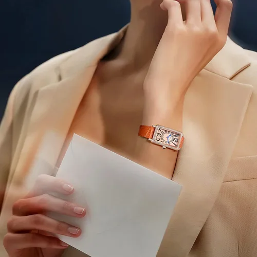 Vista 4 de Reloj rectangular de oro rosa para mujer con bisel de piedra blanca y esfera naranja, marcadores numéricos irregulares de hora, reloj de pulsera