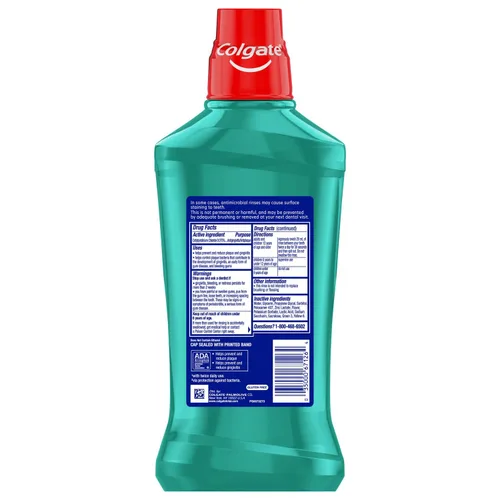 Vista 2 de Colgate Total Advanced Pro-Shield - Enjuague bucal Spearmint Surge - 33.8 oz