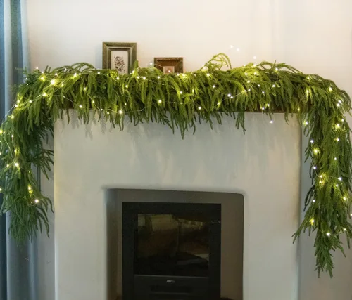 Vista 11 de MISSPIN 6ft Christmas Garland with String Lights, Real Touch Norfolk Pine Garland, Green Artificial Greenery Garland for Table, Mantle, Wall