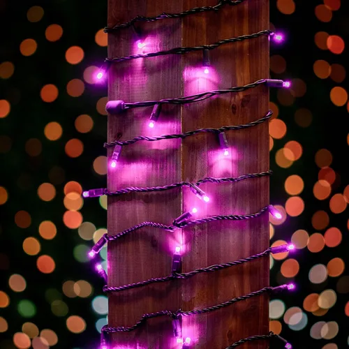 Vista 3 de Novelty Lights Guirnalda de luces navideñas de 11 pies, 50 bombillas LED rosas en cable negro, espacio de 2.5 pulgadas, iluminación conectable