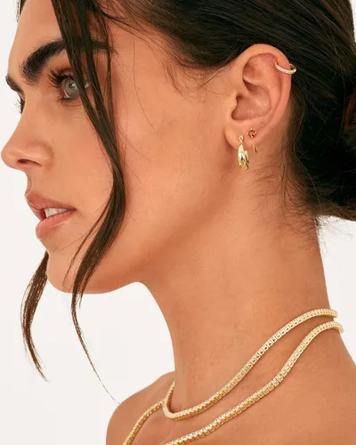 Vista 5 de PAVOI 925 Sterling Silver 14K Gold Plated Cubic Zirconia Sparkling Round Huggie Ear Cuff Gold Earrings for Women Clip On Cartilage