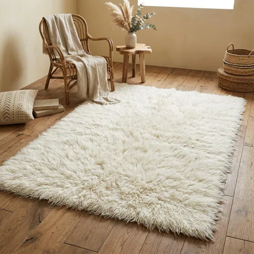 Vista 7 de Elegantes alfombras griegas flokati. Pelo suave y esponjoso de 3 pulgadas. 100% lana natural. Alfombra moderna de color blanco roto lanudo