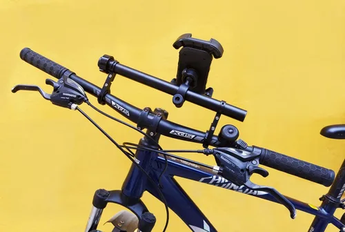 Vista 5 de Extensor de manillar de bicicleta con soporte para teléfono, barra de extensión de aluminio de 11.9", se ajusta a barras de 18–34mm, soporte
