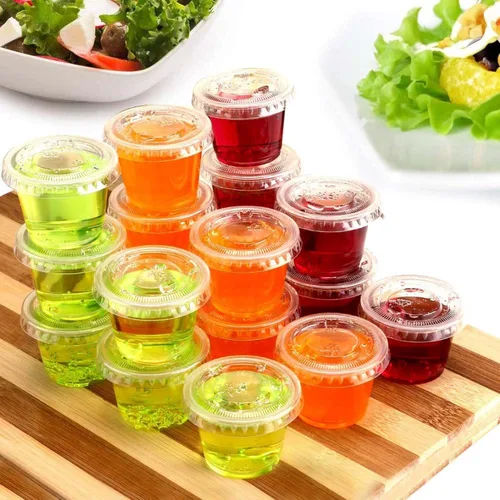 Vista 3 de TashiBox 200 juegos de vasos de gelatina de 1 onza con tapas, vasos de plástico para porciones de soufflé con tapas, transparentes