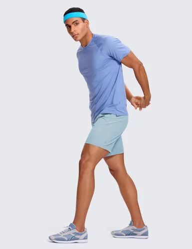 Vista 3 de CRZ YOGA Pantalones cortos de entrenamiento sin forro para hombre, 7 pulgadas, secado rápido, para correr, deportes, gimnasio, con bolsillos