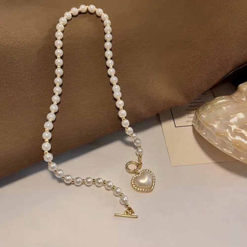 Vista 4 de GELMOINY Collares de perlas para mujer, collar de perlas de imitación de 0.23 pulgadas, collar de perlas de corazón chapado en oro de 14 quilates