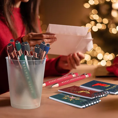 Vista 7 de Qeeenar 48 piezas de recuerdos de fiesta de Navidad, 24 mini bloc de notas en espiral de Navidad y 24 bolígrafos retráctiles de Papá Noel