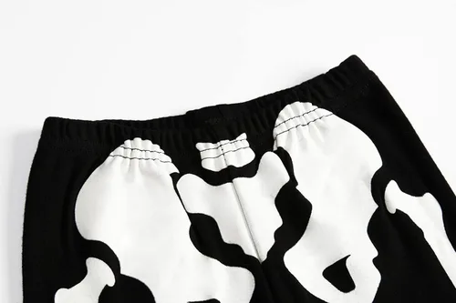 Vista 7 de Pijamas de Halloween para niños y niñas, pijamas de esqueleto que brillan en la oscuridad, pijamas de calabaza para niños, ropa de dormir 100%