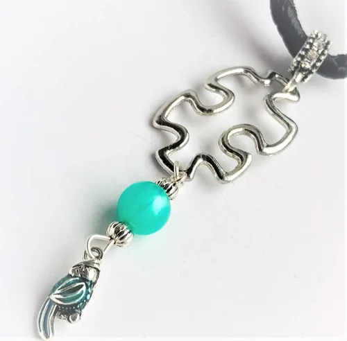 Vista 3 de Blue Parrot Bird, Puzzle, Fiber Glass Necklace Sterling Silver Chain Ends Black Leatherette