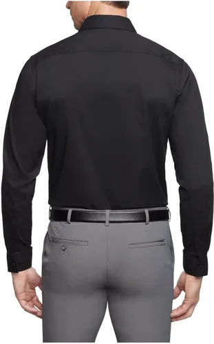 Vista 2 de Van Heusen Camisa de vestir para hombre de ajuste regular con protección contra manchas elástica