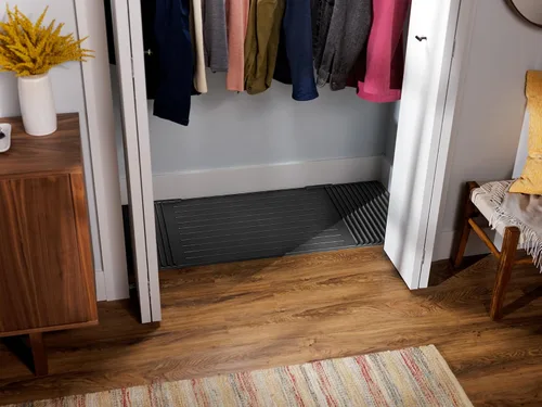Vista 2 de WeatherTech ClosetMat, tapete de 55 x 22 pulgadas, protección para suelos de armario, recortable, color negro