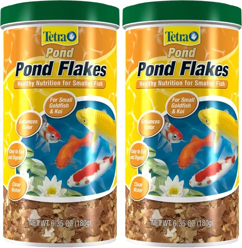 Vista 3 de Tetra Pond PondFood - Escamas de color para estanques, alimentos para peces en escamas que mejoran el color para estanques pequeños, 6 onzas (77021)