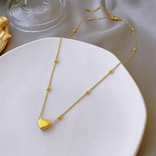 Vista 2 de Paquete de 2 collares con dije de corazón de circonita cúbica de titanio para mujeres, adolescentes y niñas, de acero inoxidable, cadena de capa