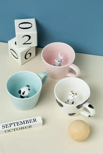 Vista 9 de DIHOclub Taza de cerámica de panda con animal 3D oculto, taza de figura de animal de dibujos animados hecha a mano, taza linda, regalo de Navidad