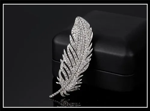 Vista 4 de Broche de plumas de cristal para mujeres y hombres con diamantes de imitación, broche de metal, accesorio de ropa, joyería, boda, fiesta nupcial