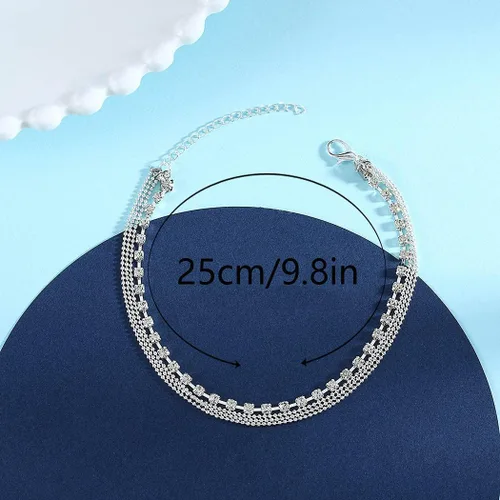 Vista 4 de JEWEKY Tobilleras bohemias de cristal en capas, pulseras de tobillo con diamantes de imitación plateados, cadena de playa, joyería para mujeres