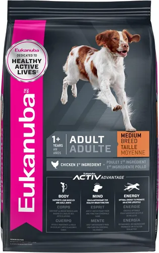 Vista 2 de Eukanuba Alimento seco para perros adultos de raza media, bolsa de 16 libras para adultos con cordero y arroz, lata de 13.2 onzas (12 unidades)