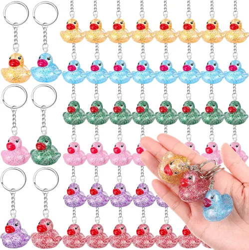 Vista 8 de Deekin 60 llaveros de goma de pato de 1.4 pulgadas, diseño chirriante de pato de crucero, cadenas 3D a granel para regalo de fiesta de carnaval