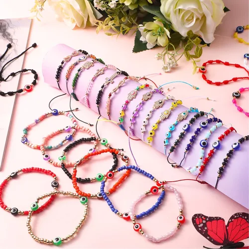 Vista 2 de WILLBOND 60 pulseras de ojo malvado pulseras mexicanas con nudo de cuerda pulseras de cuentas ajustables pulseras de eslabones de la suerte
