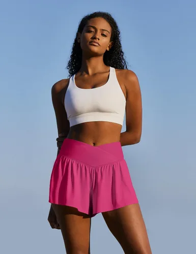 Vista 5 de IUGA Pantalones cortos fluidos 2 en 1, pantalones cortos de mariposa, pantalones cortos para correr cruzados para mujer, pantalones cortos atléticos