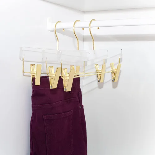 Vista 2 de HomeCube USA - Percha de acrílico transparente con ganchos y clips dorados, organizador resistente para faldas, pantalones y más, elegante diseño