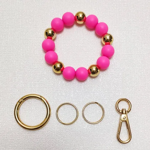 Vista 2 de Junyuerly Llavero de pulsera con cuentas de silicona para mujer, pulsera elástica con clip dorado