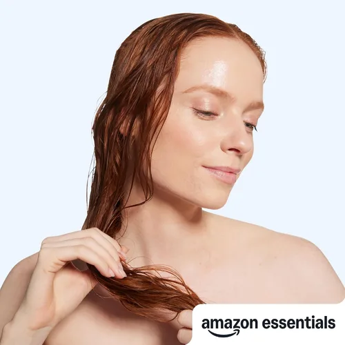 Vista 5 de Acondicionador suave y sedoso Amazon Basics para cabello seco o dañado, 28 fl oz