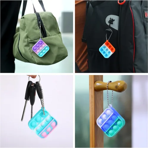Vista 5 de Paquete de 100 mini juguetes para la ansiedad, recuerdos de fiesta, juguetes sensoriales de silicona para apretar, juguetes sensoriales a granel