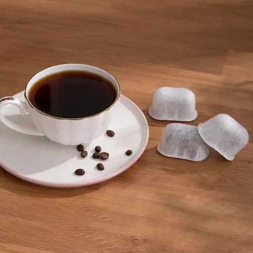 Vista 7 de Paquete de 12 repuestos de filtros de agua de carbón vegetal, para cafeteras Keurig.