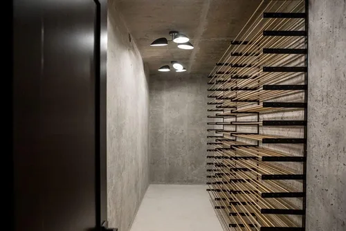 Vista 2 de VintageView Evolution Wine Wall 30 3C - Estante moderno para vino (54 botellas, negro mate/bronce dorado)