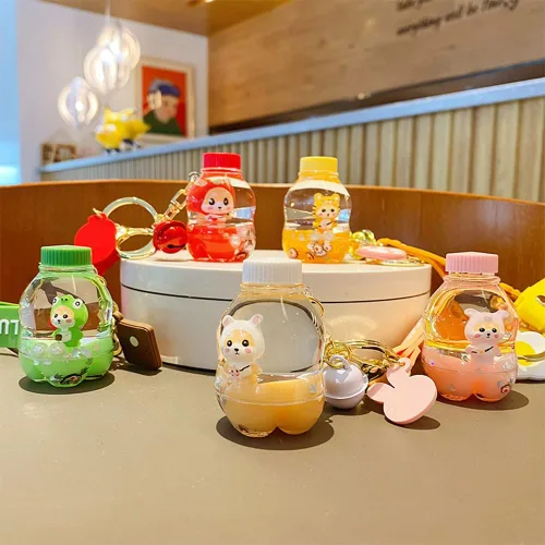 Vista 5 de BEXOA Lindo llavero Kawaii Shiba Inu líquido flotante llavero mochila colgante pulsera pulsera llavero para niñas mujeres