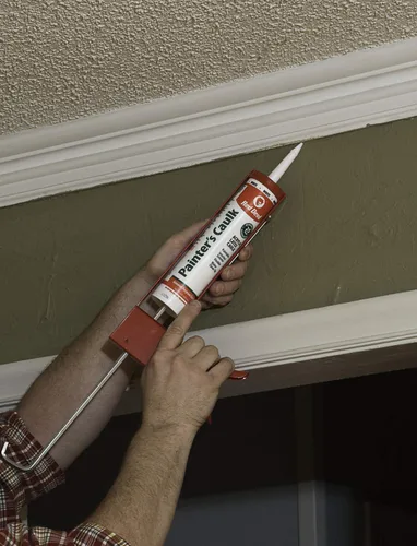 Vista 2 de Red Devil 0746 Painter's Caulk, 10.1 onzas, masilla de látex acrílico pintable para uso interior y exterior, limpieza de agua, listo para pintar
