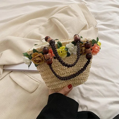 Vista 4 de Bolso de mano de paja de flores para mujer, bolso de hombro con asa trenzada retro de verano, bolso de hombro bohemio para playa y viaje
