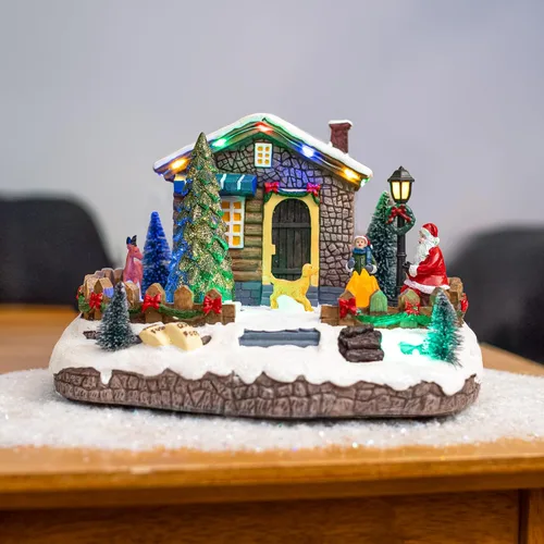 Vista 3 de Pueblo Navideño Animado de Santa en Fuga Accesorios de Casa Navideña Colección Figuritas para Decoraciones y Regalo Movimiento y Sonido
