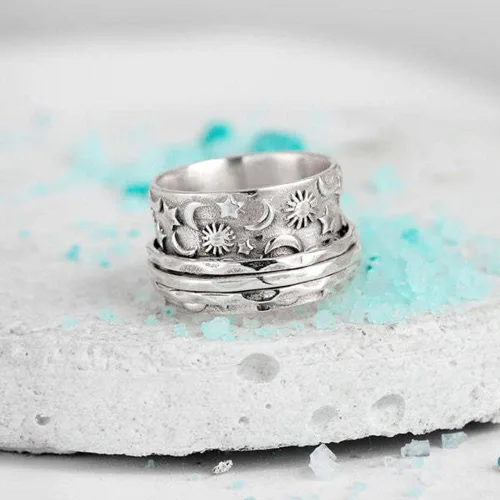 Vista 3 de Anillo giratorio con diseño de estrella de luna para mujeres, niñas y hombres, anti ansiedad, gira libremente, inspiraciones, alivio del estrés