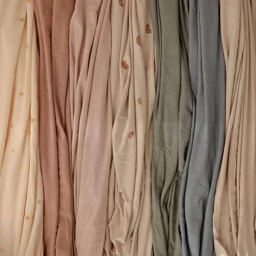 Vista 7 de mushie Manta Envolvente Elástica para Bebé Extra Suave y Ajuste Ceñido 47"x47" (Blush)